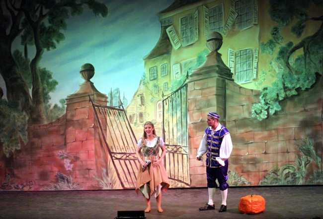 Cinderella Pantomime Broxbourne: Cinderella and Buttons outside Hardup Hall with slipper